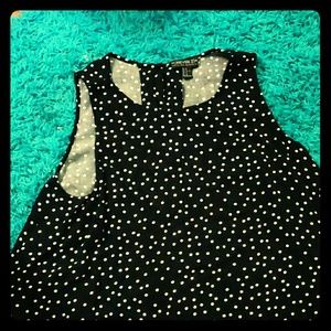 A black and white polka dot blouse